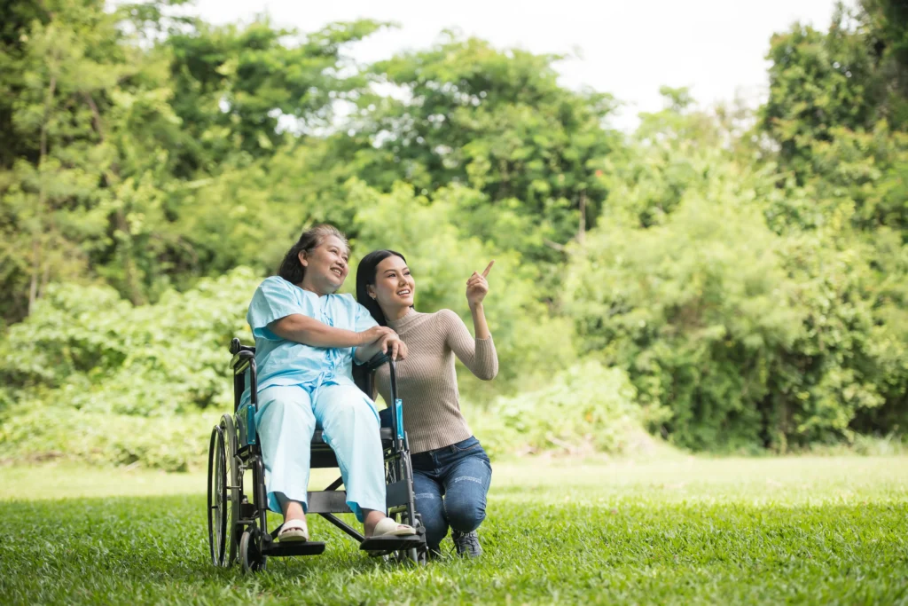 Carer in Aberdeenshire supporting safe outdoor mobility in local community